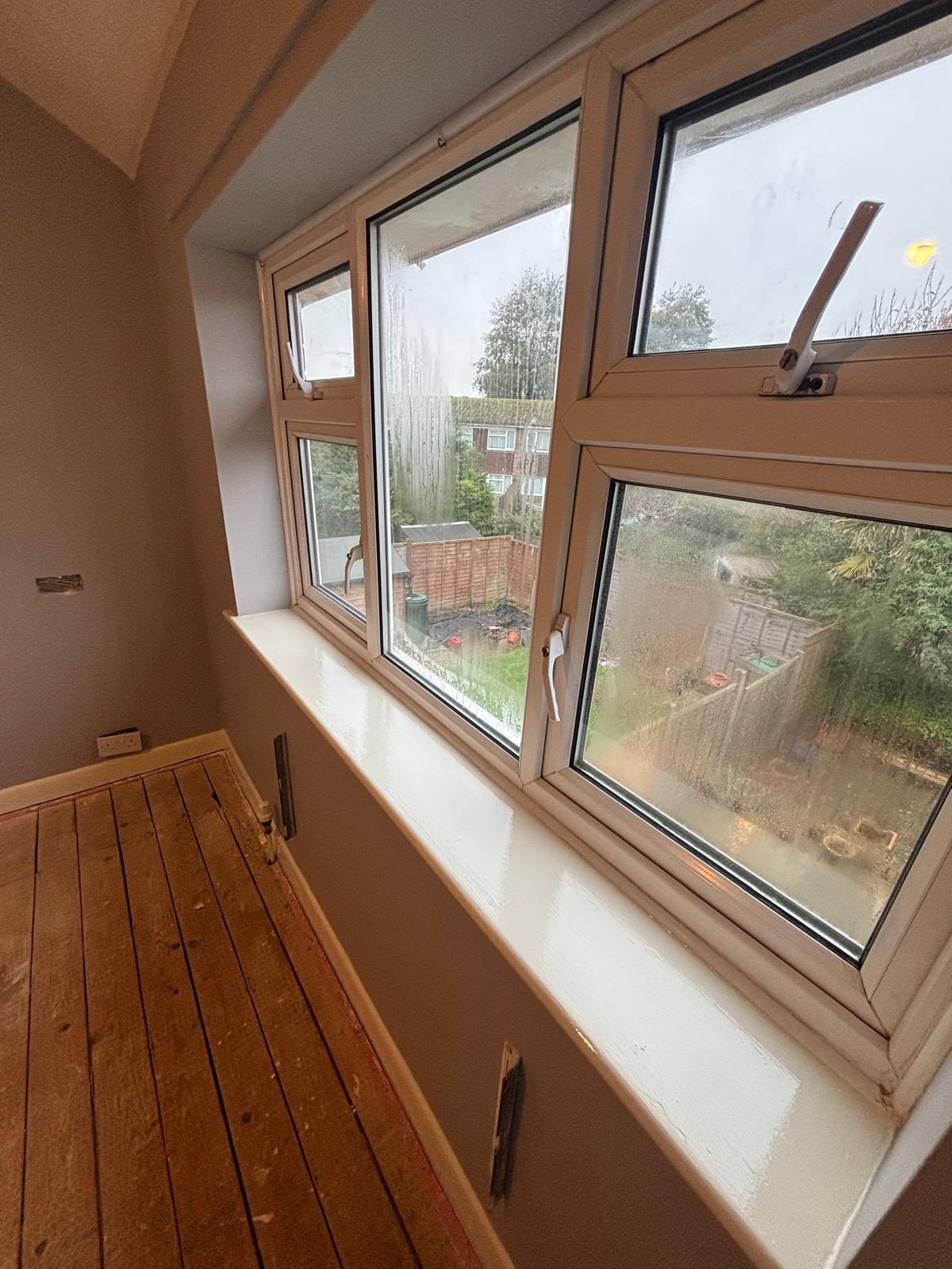 Interior room with bench and garden view